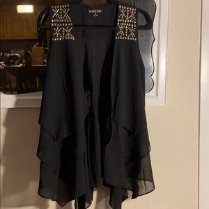 Handkerchief cut sheer vest with a little edge